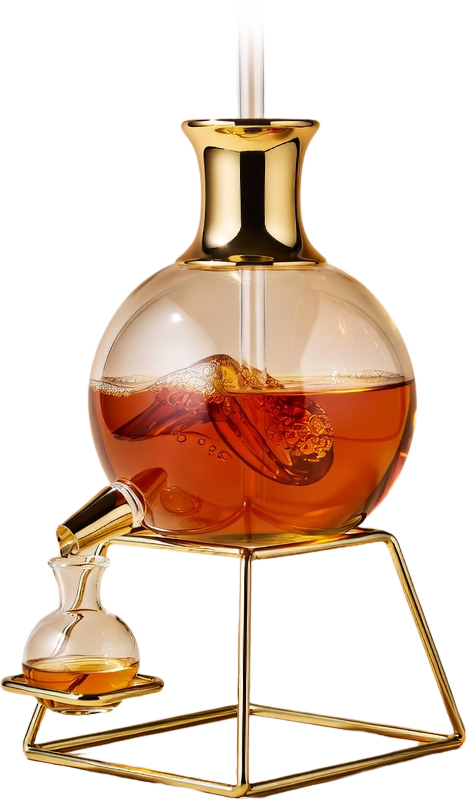 The house still: rosé essence distilling into the reserve vial